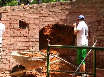 digging out behind wall for fireplace