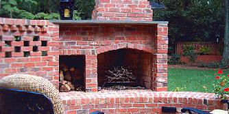 brick fireplace with privacy wall