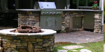 outdoor kitchen with gas log firepit