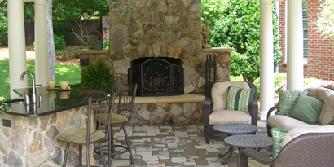 stone fireplace with sandstone hearh and mantle