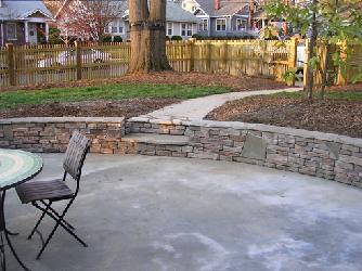 cultured stone retaining wall with steps