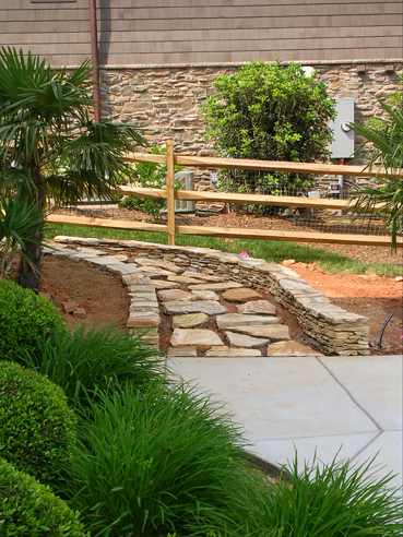 stepping stones with stacked stone walls